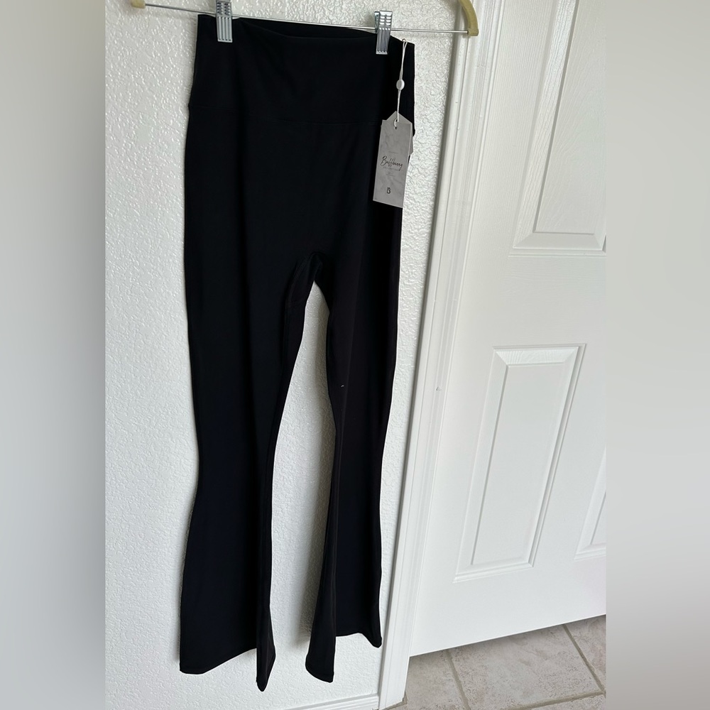 Black foxy flare legging. New with tags